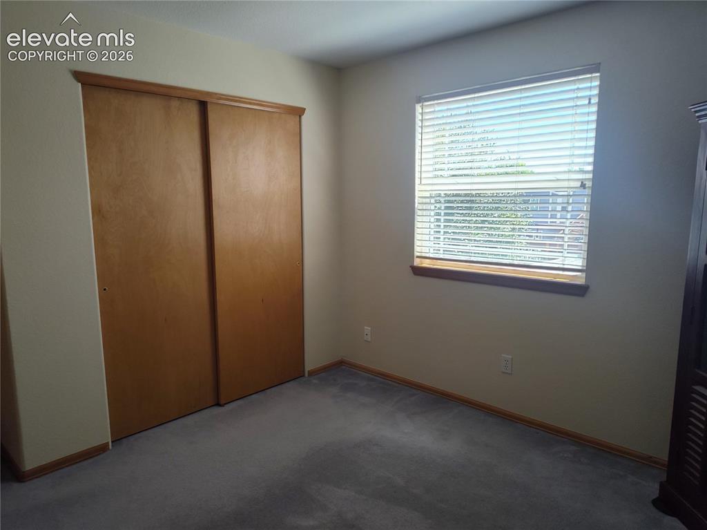 Image 35 of 49: Third bedroom upper level