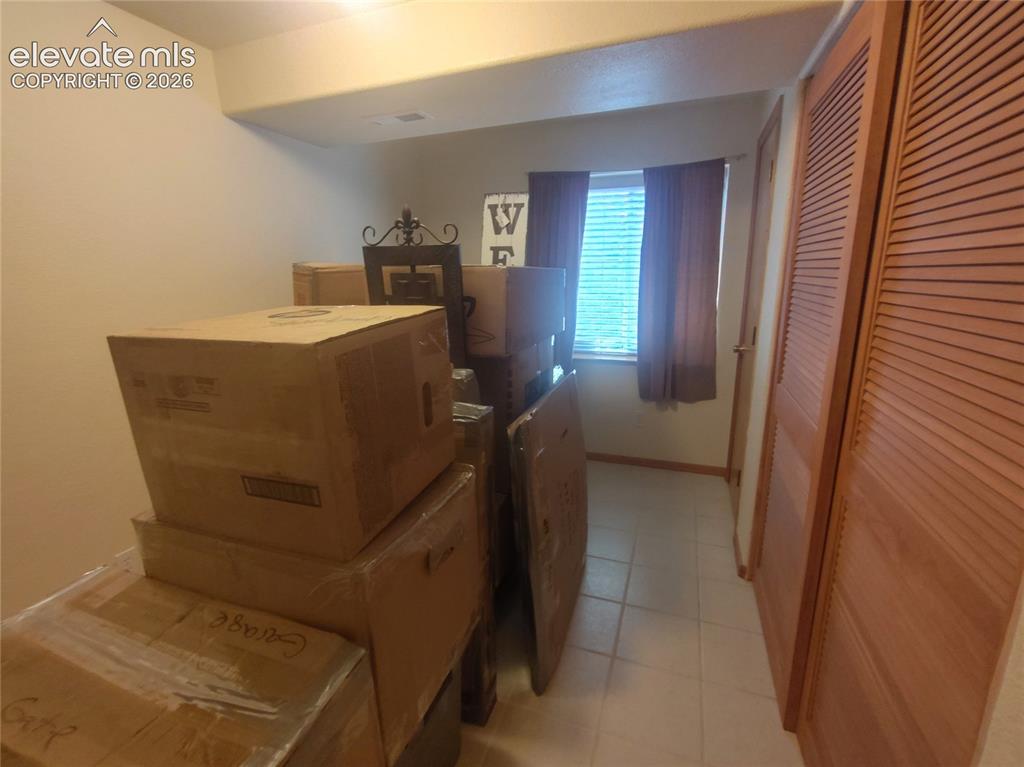 Image 42 of 49: Fifth bedroom in basement