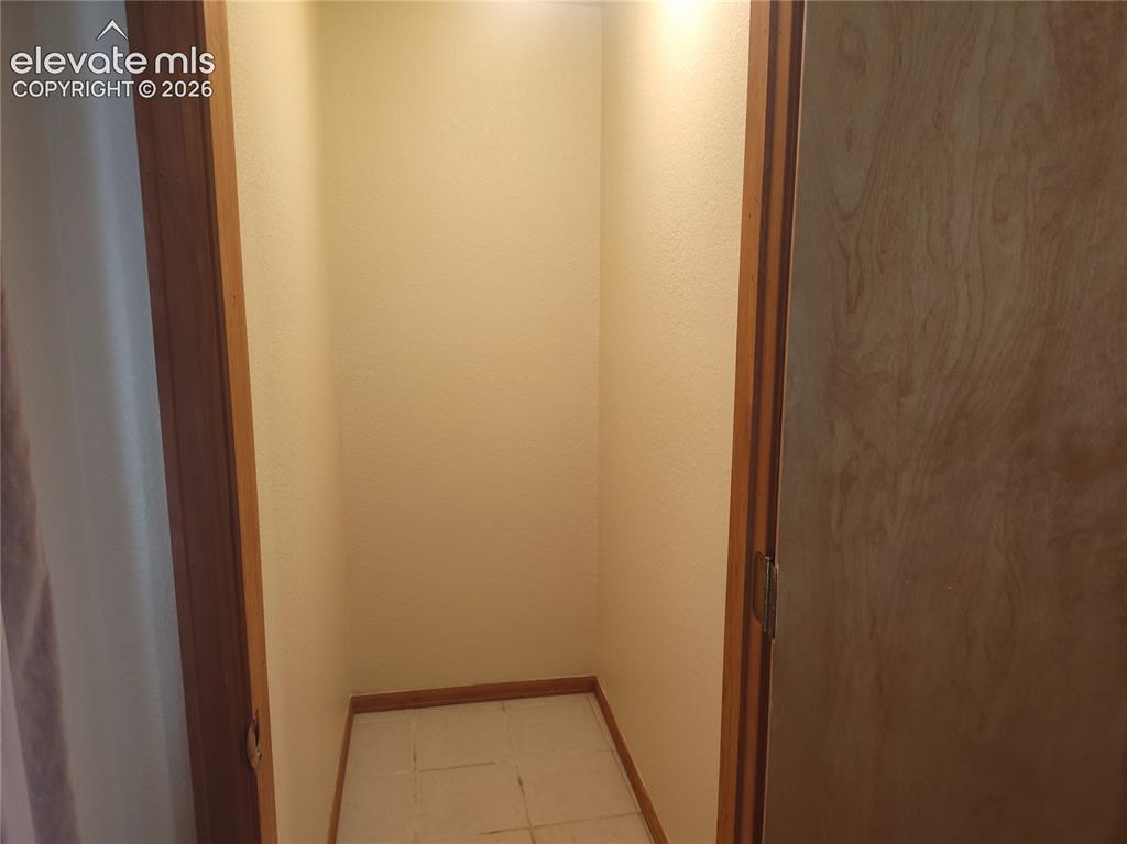 Image 43 of 49: Walk-in Closet
