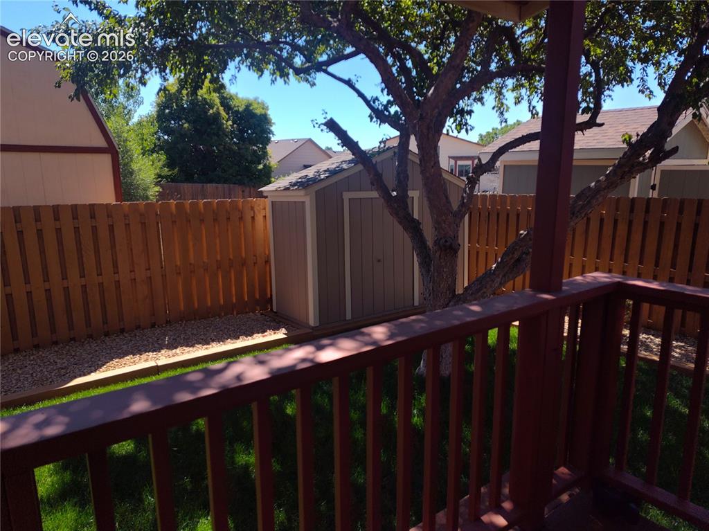 Image 45 of 49: Landscaped backyard