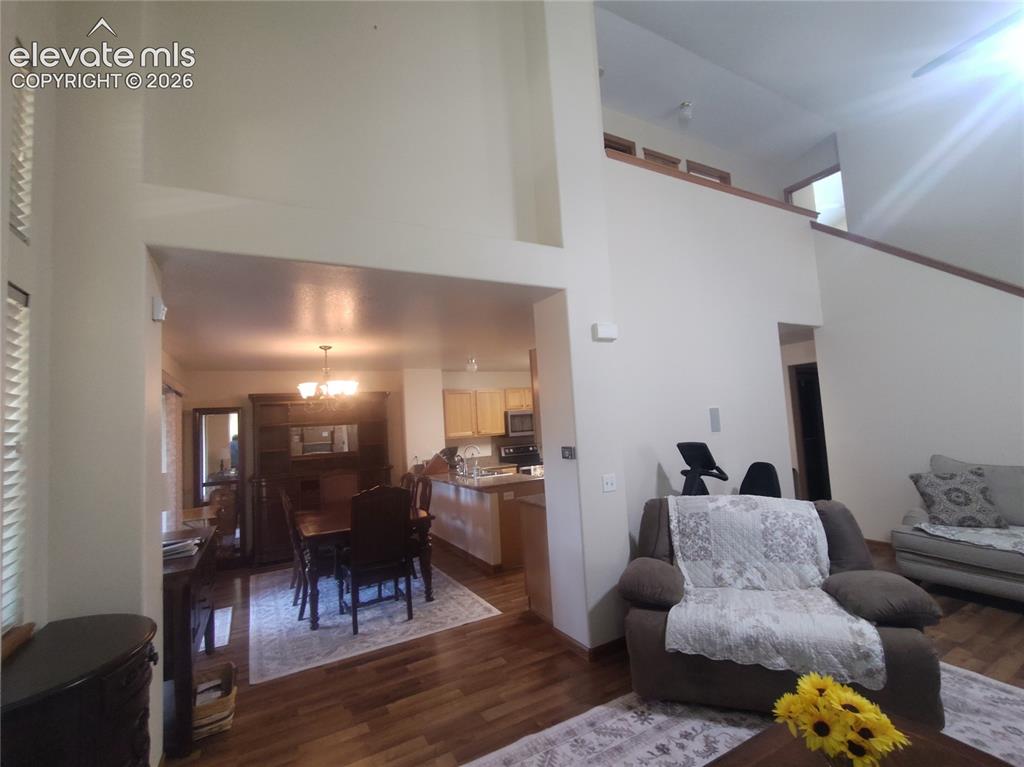 Image 7 of 49: Living room going into dining room