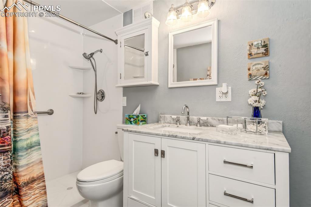 Image 20 of 50: Basement Bathroom