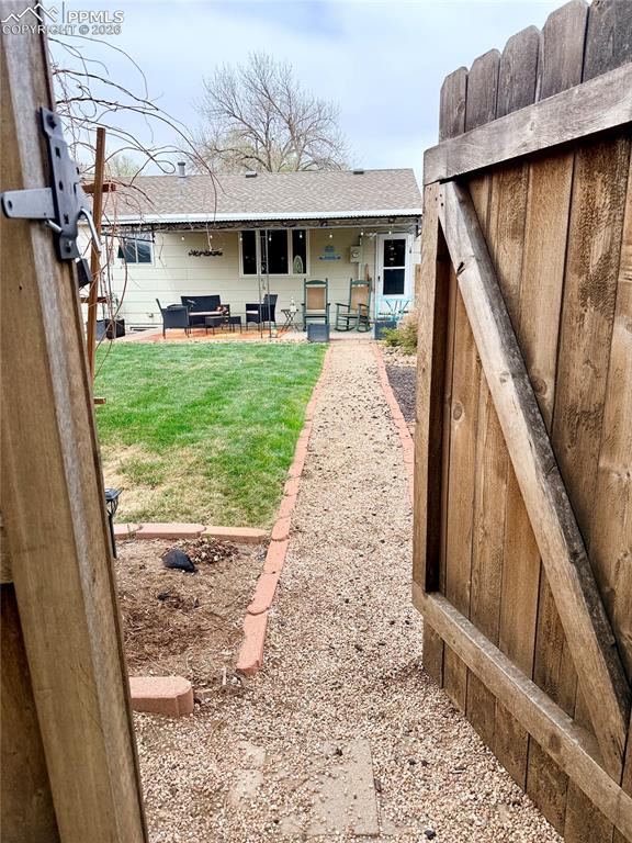 Image 49 of 50: Through Gate from Park to Home