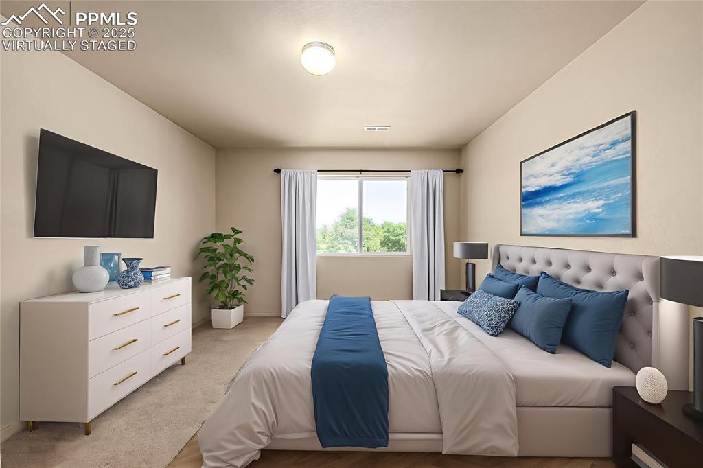 Image 10 of 30: Virtually Staged - The primary suite is sure to please 