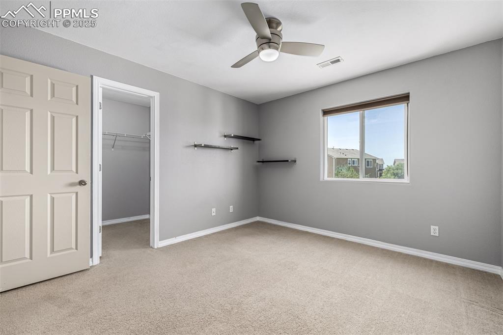 Image 20 of 30: Secondary Bedroom with Walk In Closet