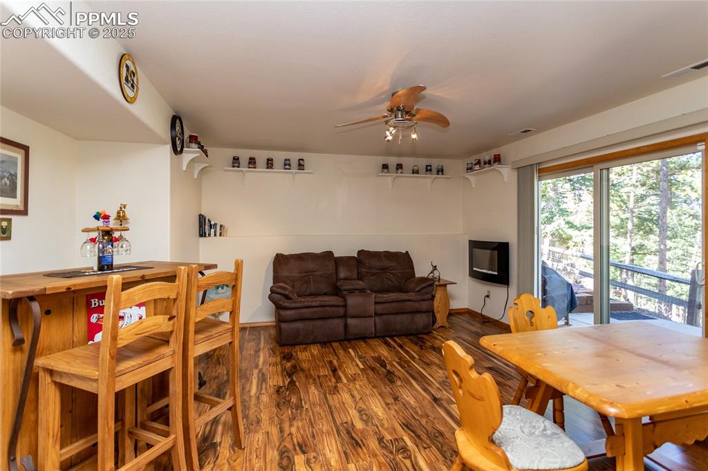 Image 33 of 44: Lower level family room with walk-out