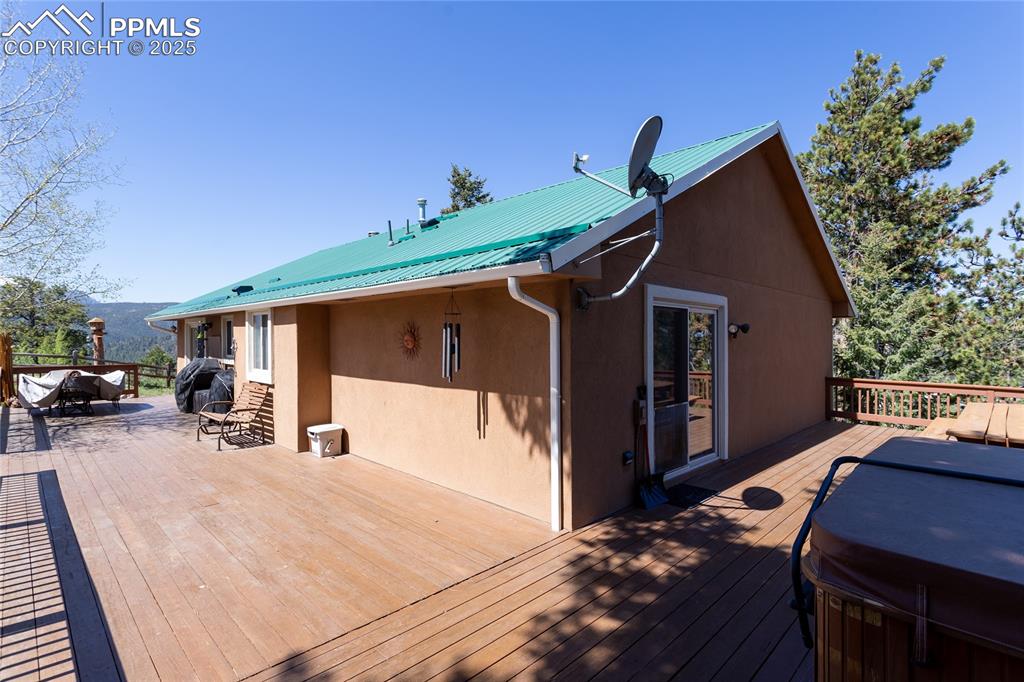 Image 41 of 44: View of 1300 sq. ft. wrap-around deck