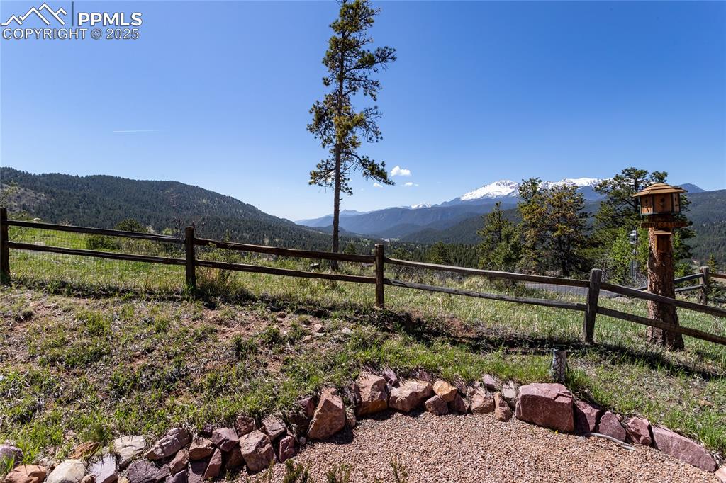 Image 42 of 44: View of mountain backdrop from backyard