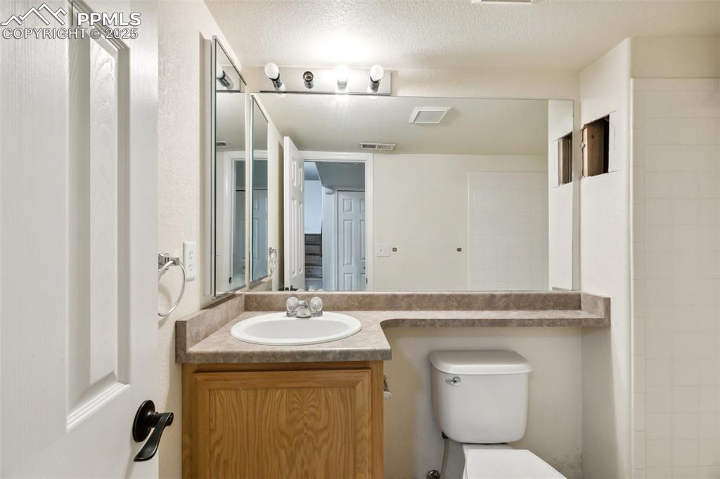 Image 24 of 28: Basement bathroom