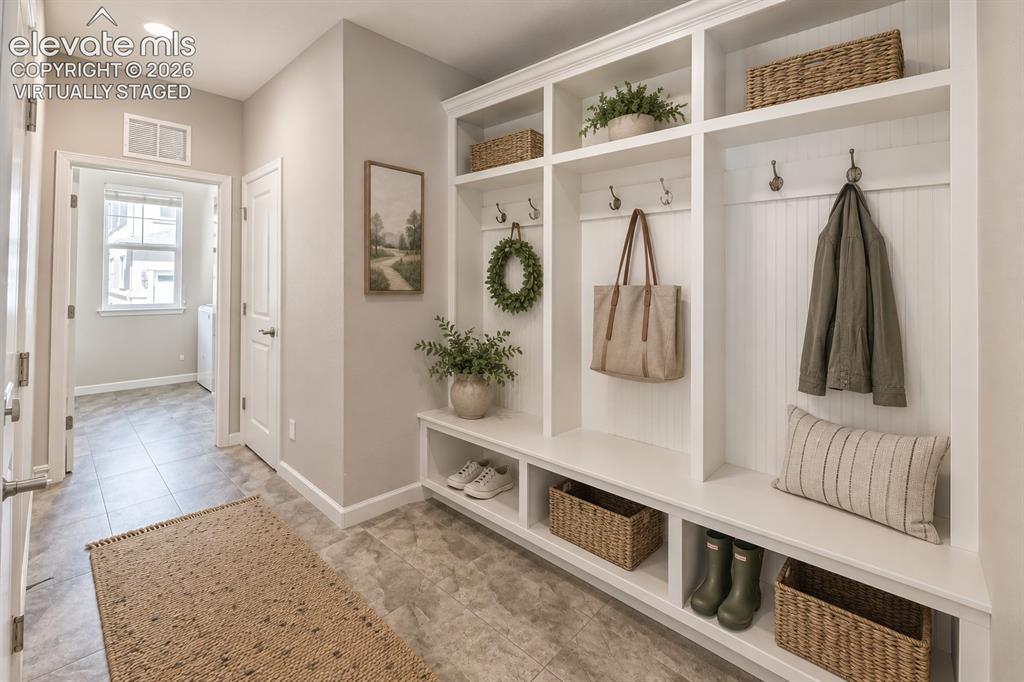 Image 11 of 39: Virtually staged mud room