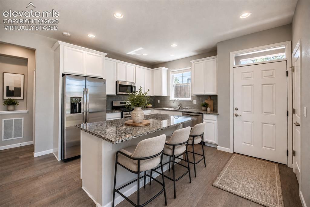 Image 5 of 39: Virtually staged kitchen
