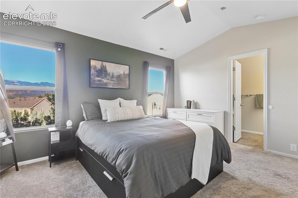 Image 7 of 26: Large master bedroom with two closets and mountain views
