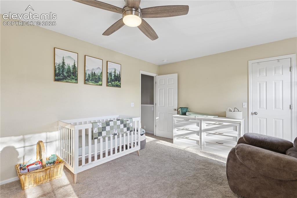 Image 8 of 26: Secondary spacious bedroom with its own bathroom