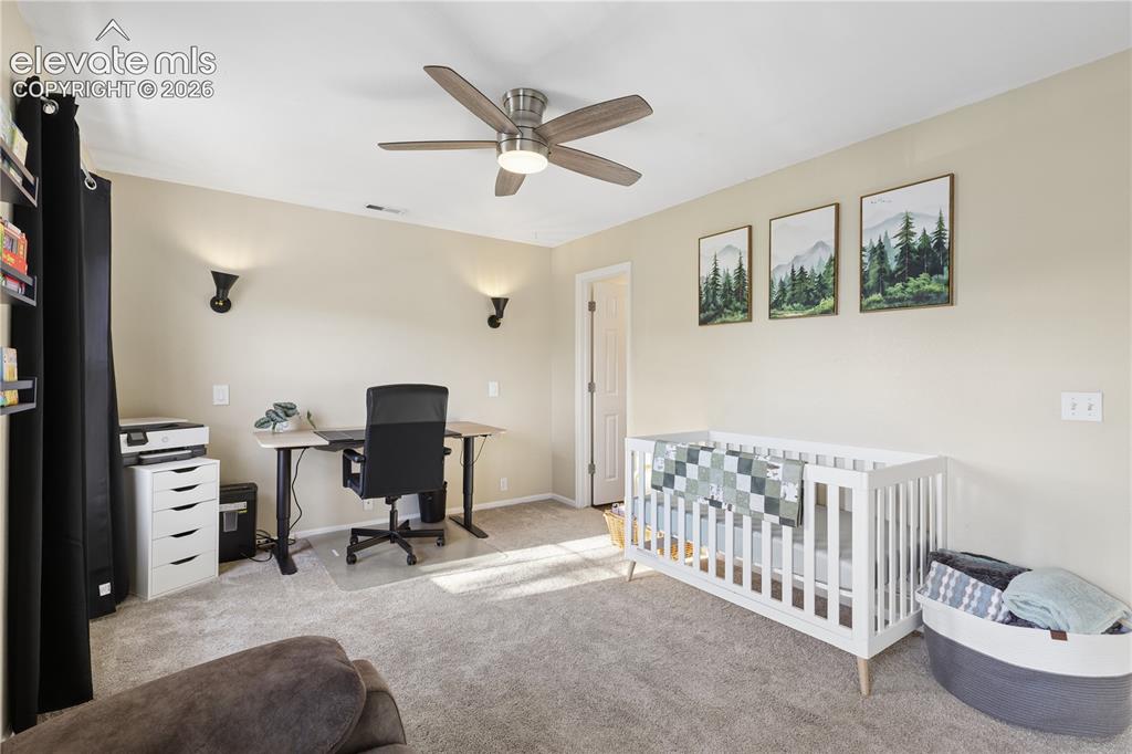 Image 9 of 26: Secondary spacious bedroom with its own bathroom
