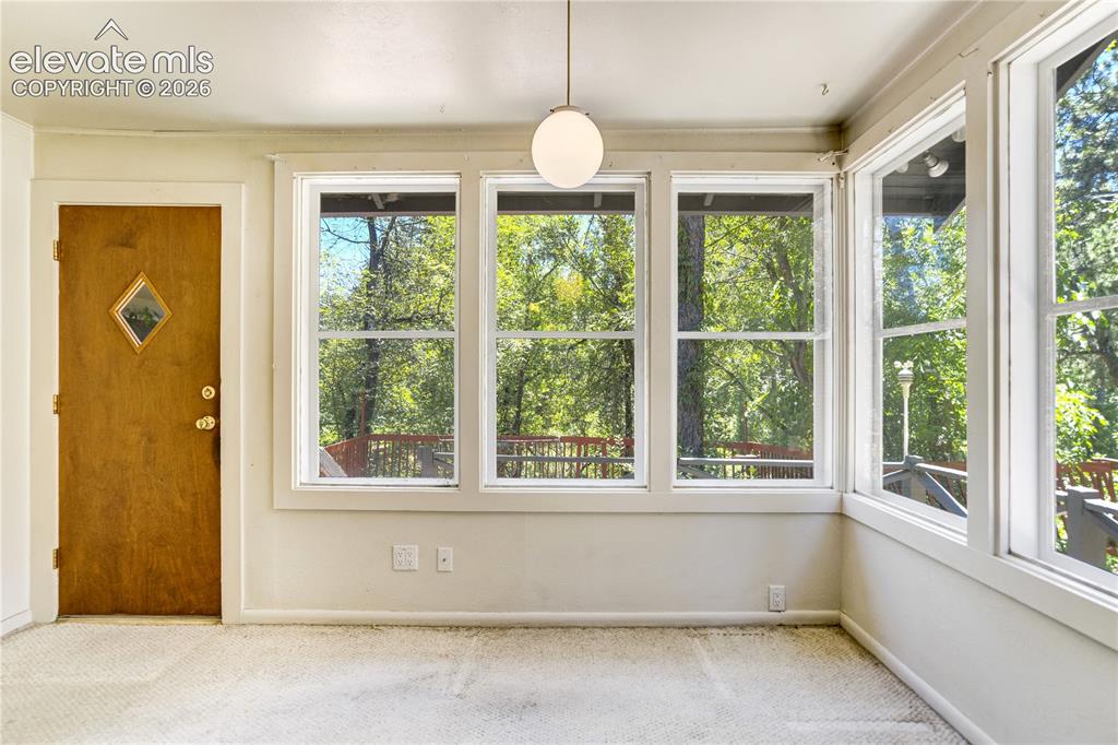 Image 3 of 20: Dining Area w/ expansive windows