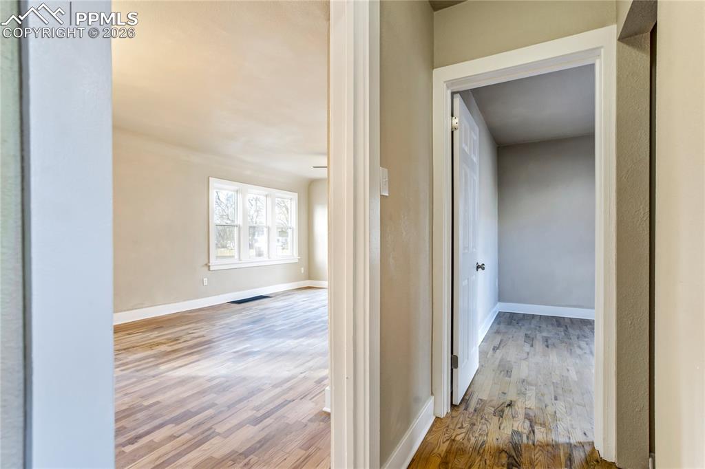 Image 14 of 28: Hallway between rooms