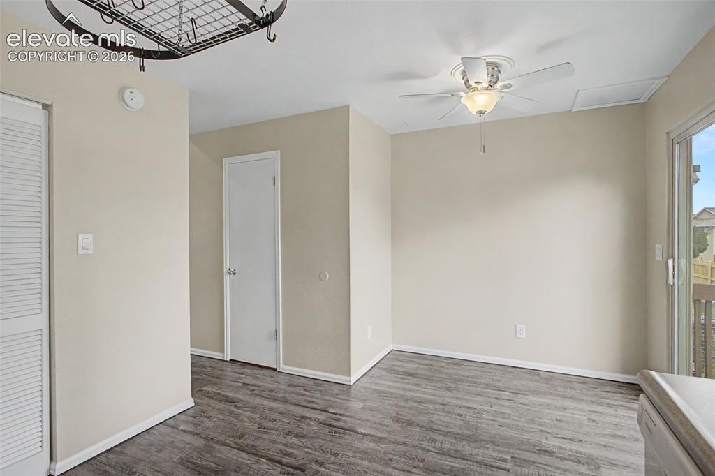 Image 14 of 26: The Dining Room sits off of the Kitchen and offers access to the home