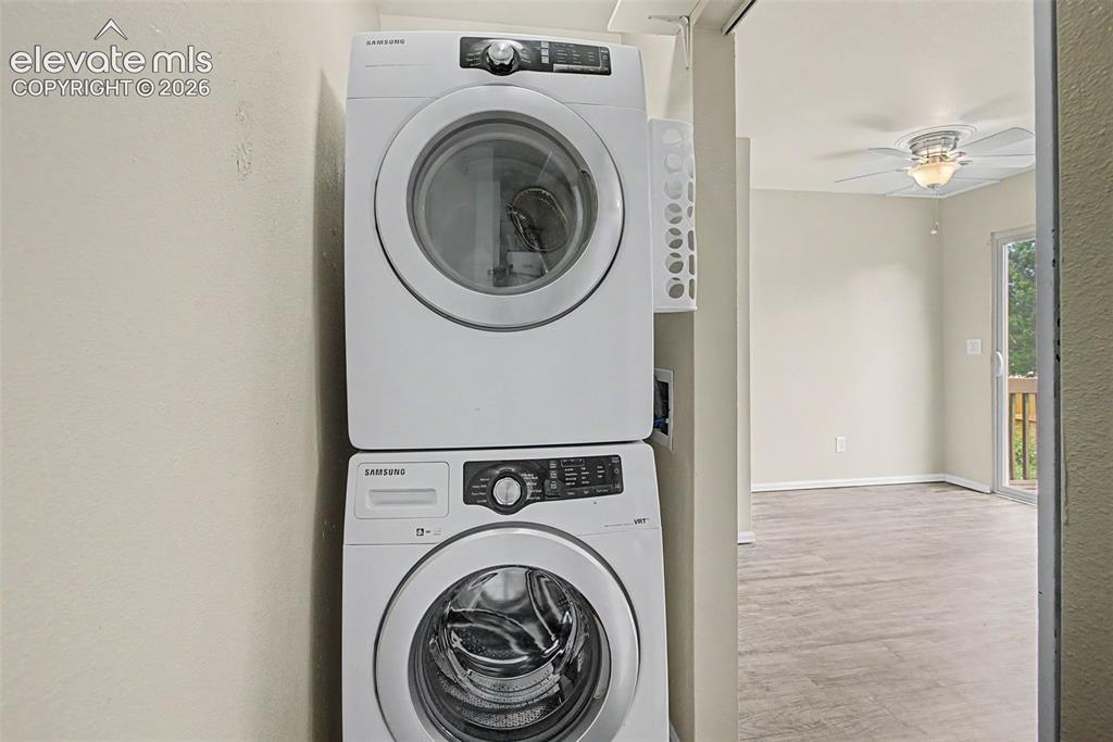 Image 15 of 26: The Laundry Space comes with a washer and dryer!