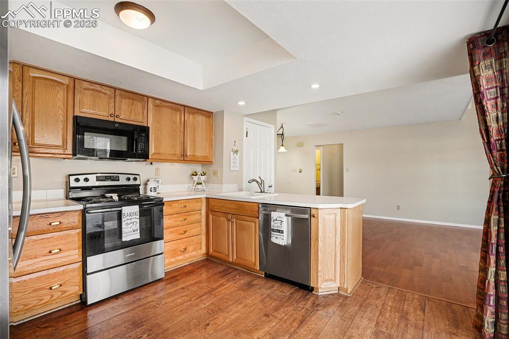 Image 11 of 29: Spacious, well-appointed kitchen offering ample counter and cabinet space, 