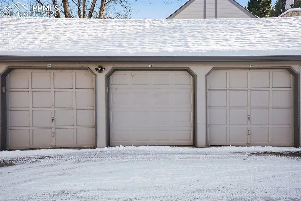 Image 25 of 29: Detached garage with ample space for vehicles and storage