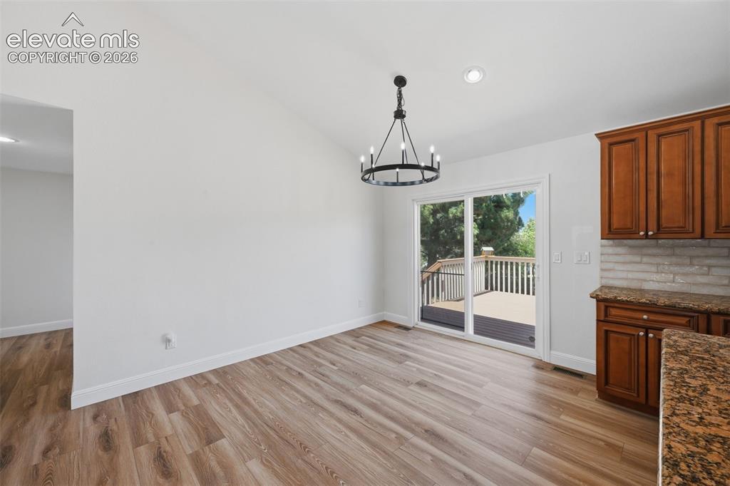 Image 13 of 36: Walk out to oversized deck