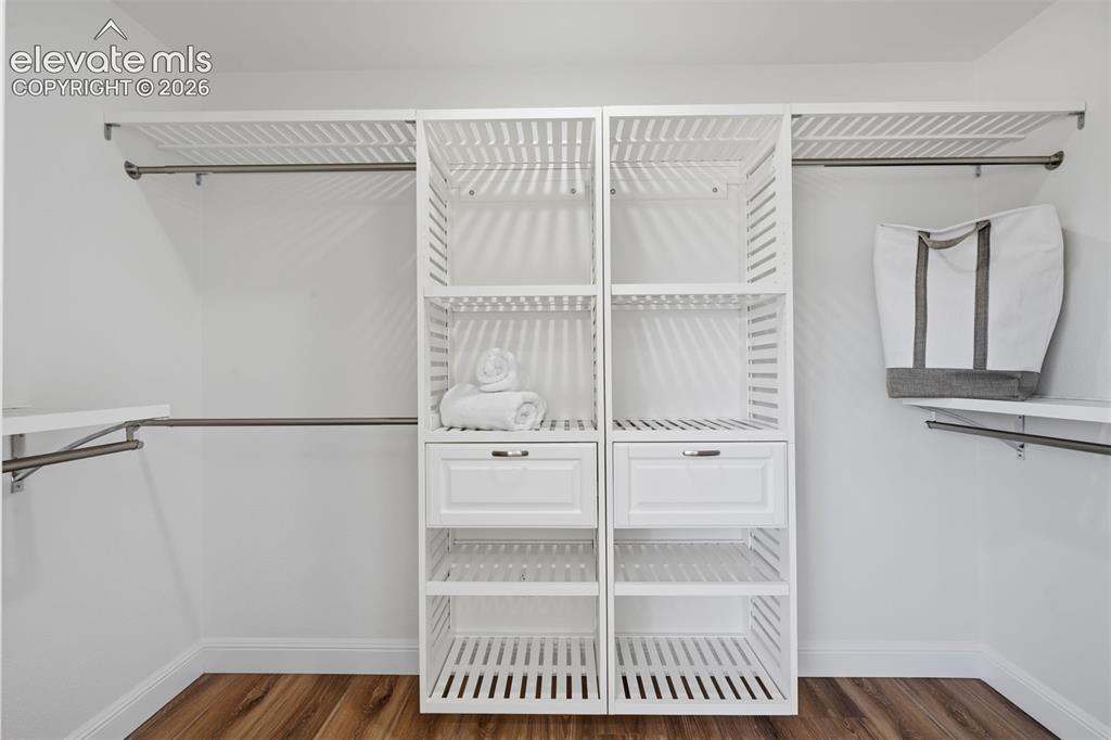 Image 24 of 36: Primary Walk-in Closet