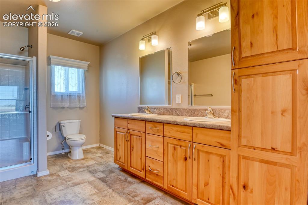Image 14 of 50: Master Bathroom