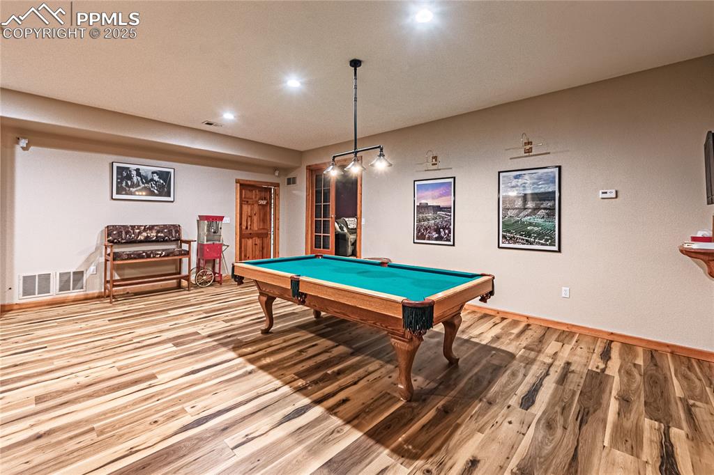 Image 40 of 50: Rec room featuring billiards table, light wood finished floors, and recesse