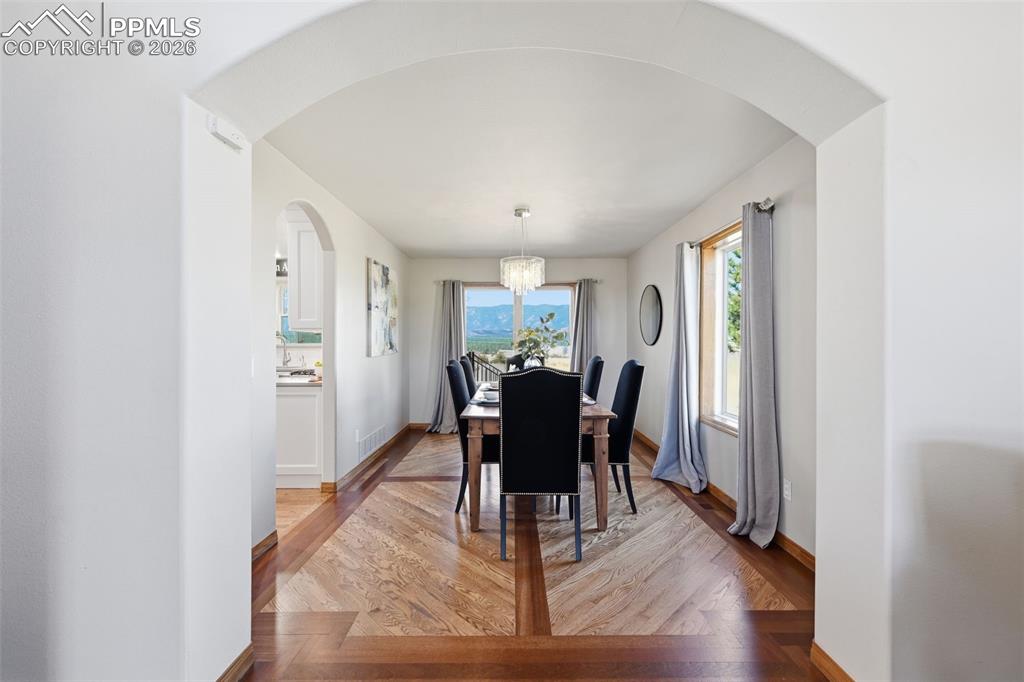 Image 19 of 50: Custom inlaid floors.