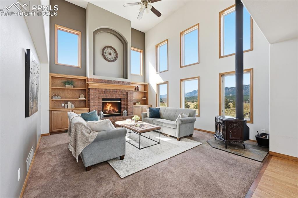 Image 26 of 50: Soaring ceilings and a wall of views.