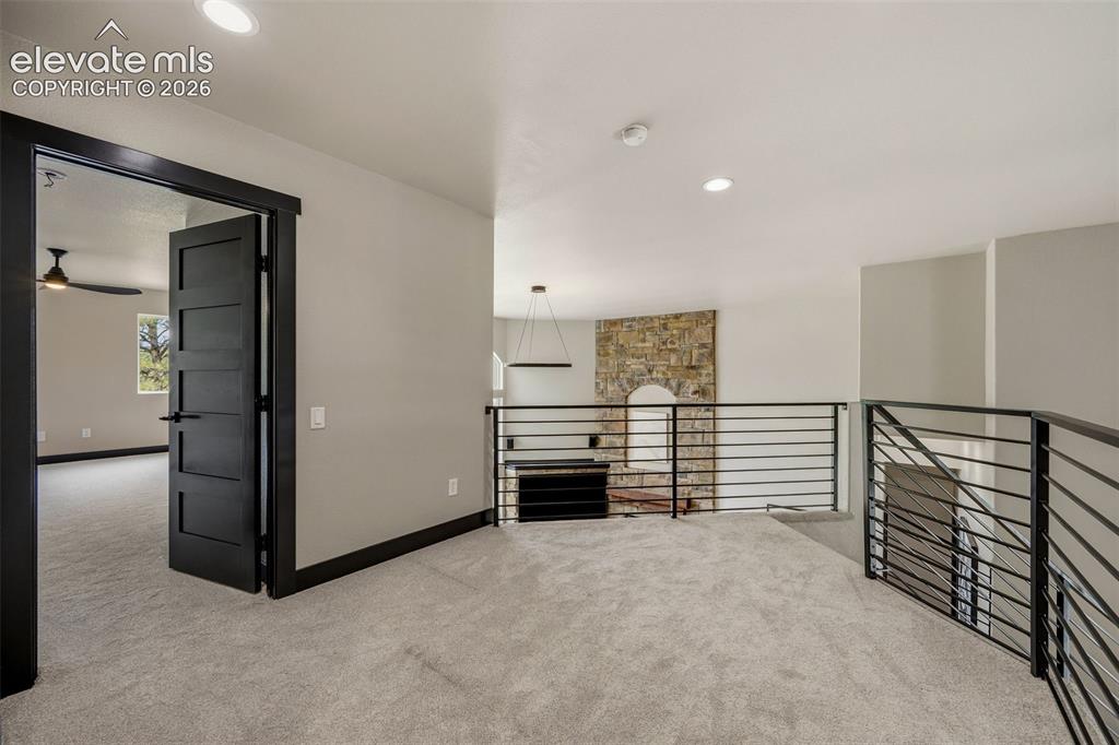 Image 15 of 46: Upstairs landing overlooking family room