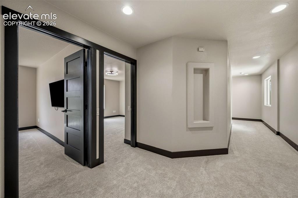 Image 23 of 46: Solid core doors and brand new carpet