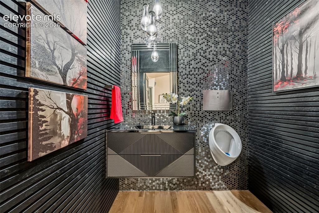Image 28 of 46: Maximalist main level half bathroom