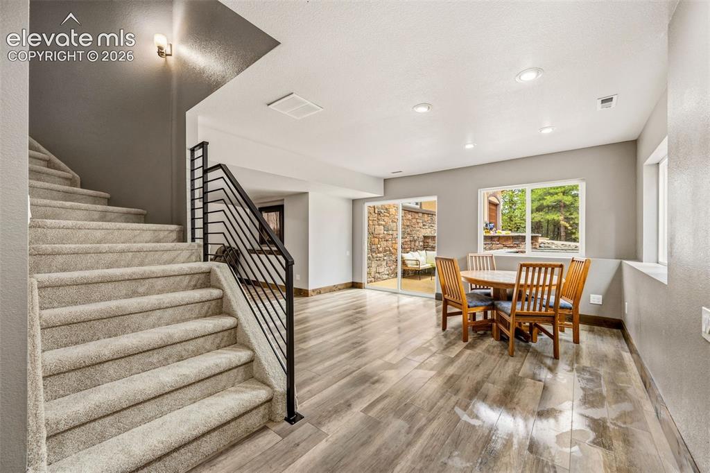 Image 29 of 46: Garden level guest quarters with walkout patio