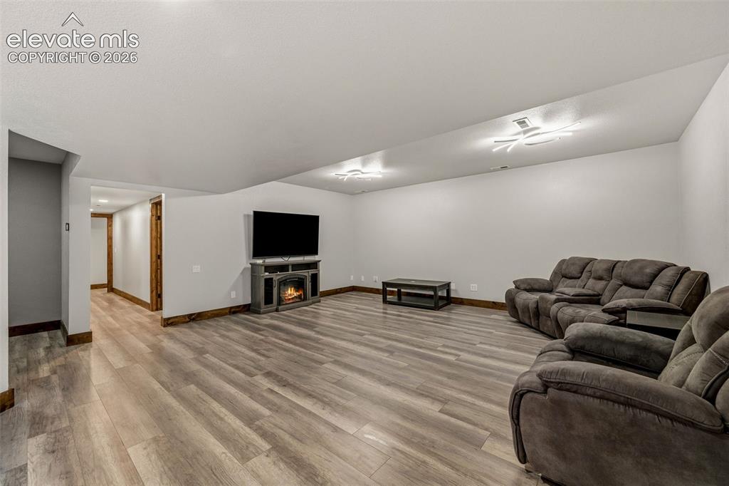 Image 33 of 46: Spacious lower level living room