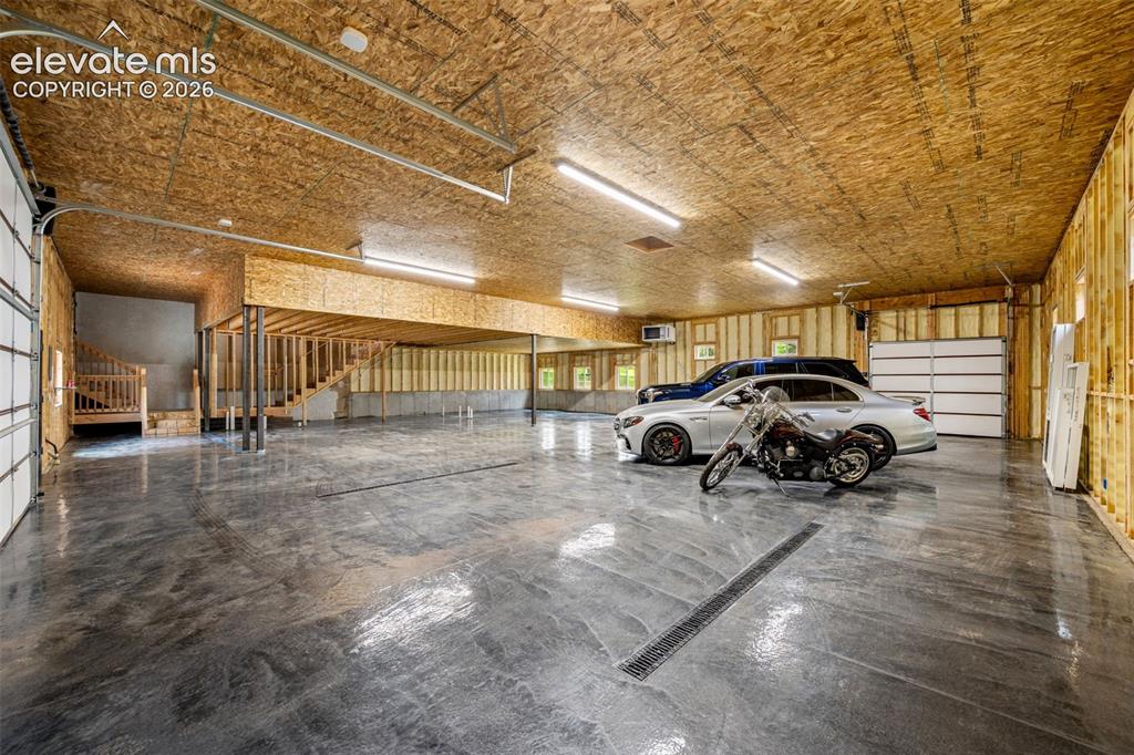 Image 37 of 46: 3000 sq ft attached garage with pull through doors
