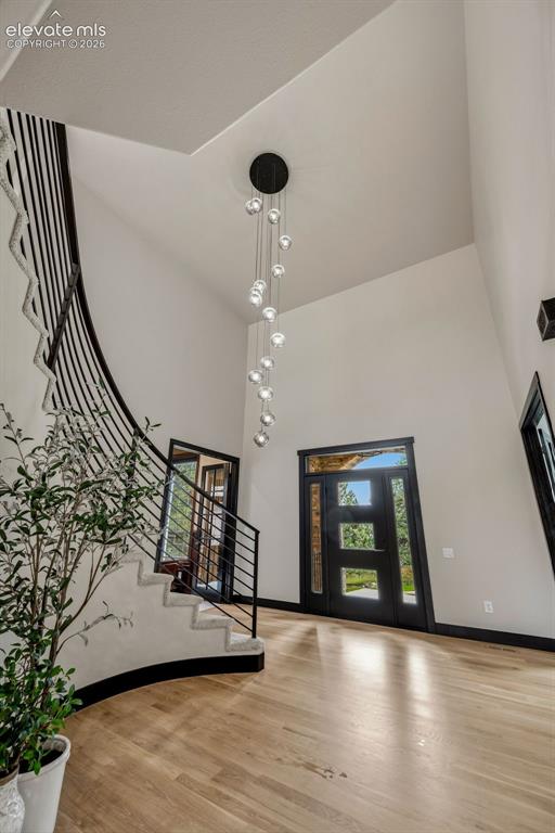 Image 5 of 46: Sweeping two story foyer