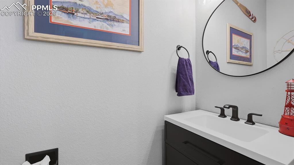 Image 21 of 50: The Kitchen has a double stainless steel sink and overlooks the Dining Area