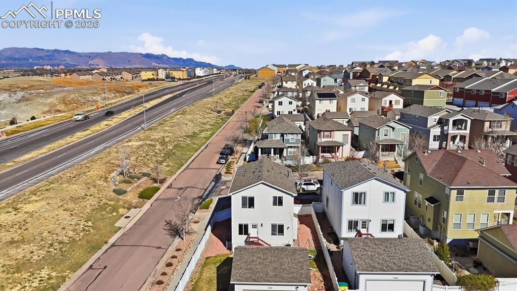 Image 47 of 50: Aerial rear view of home and lot.