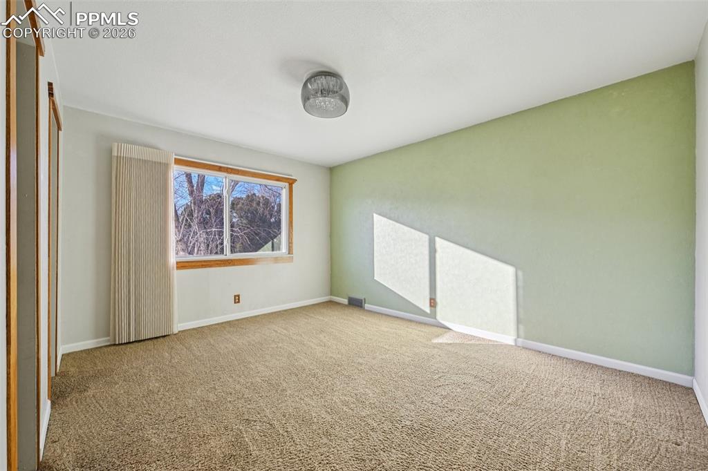 Image 13 of 50: Master Bedroom