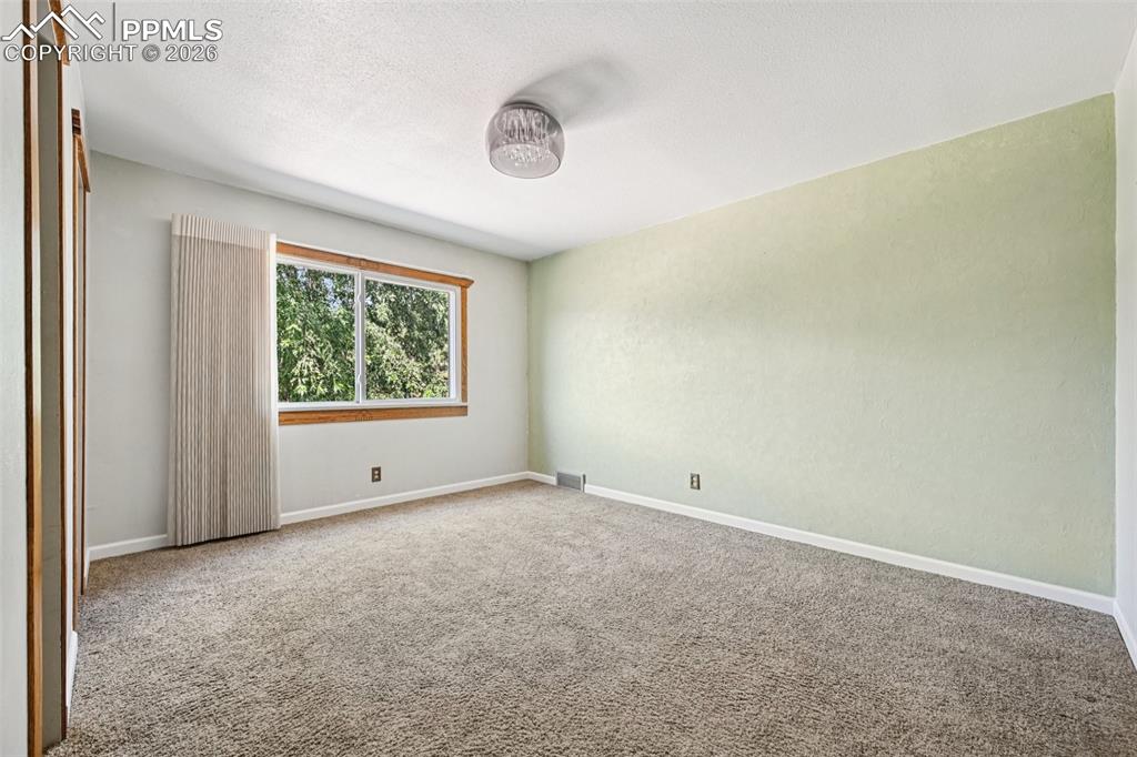 Image 16 of 50: Master Bedroom