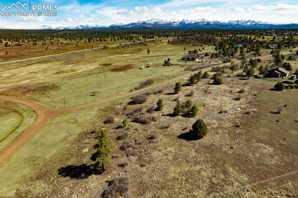 Image 10 of 31: Overview of rural landscape featuring mountains