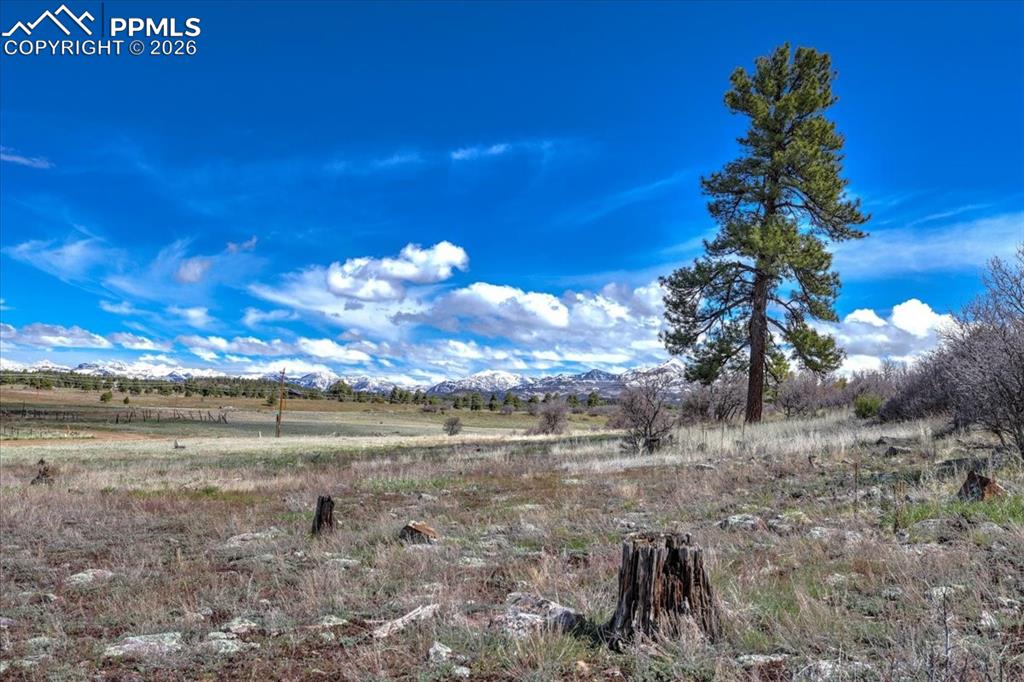 Image 16 of 31: View of undeveloped land featuring rural landscape and mountains