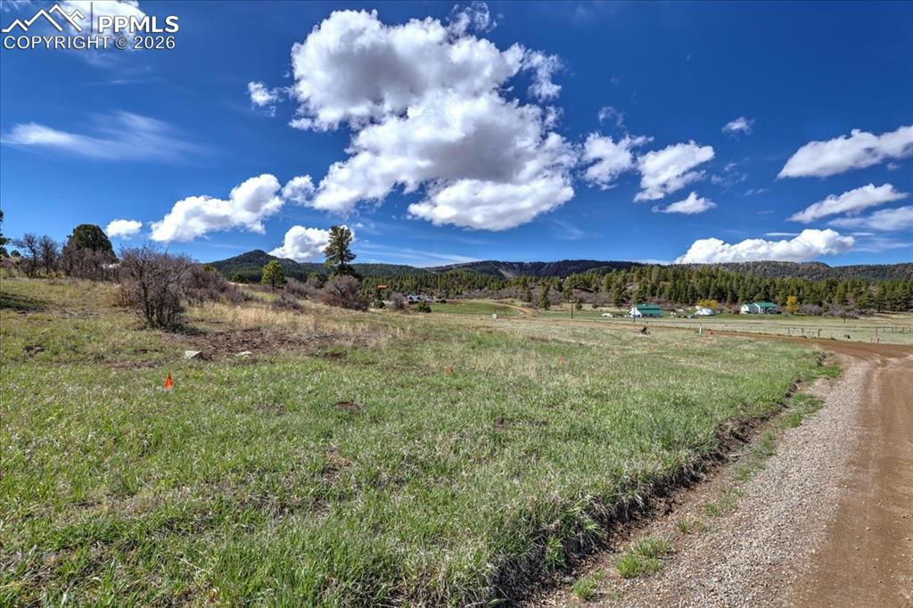 Image 30 of 31: View of mountain backdrop featuring rural landscape