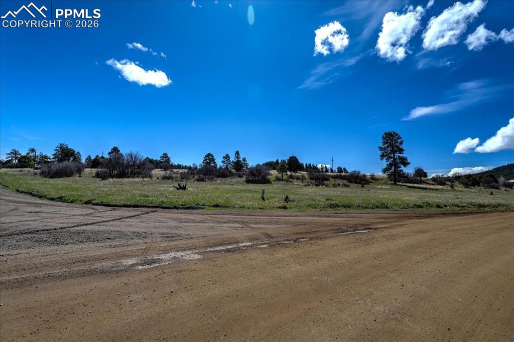 Image 31 of 31: View of dirt / gravel road featuring a view of rural / pastoral area