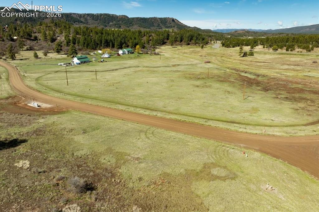 Image 8 of 31: View of rural area with mountains