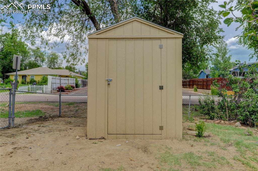 Image 19 of 21: Storage shed