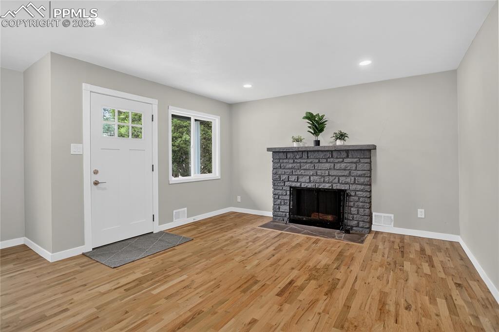 Image 3 of 21: Refinished hardwood floors & fresh interior paint