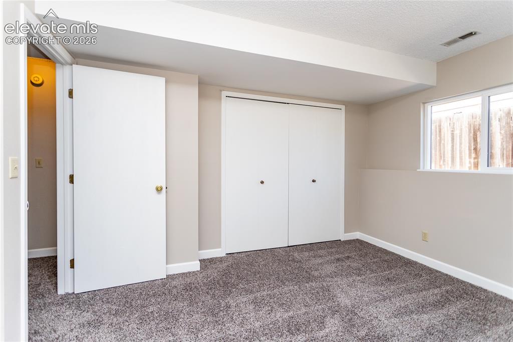 Image 20 of 27: Bedroom