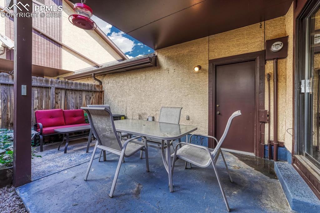 Image 34 of 46: View of patio featuring outdoor dining space